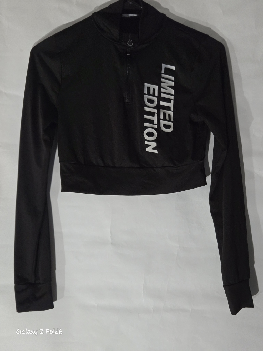 Fashion Nova Black Cropped Quarter-Zip Sweatshirt with White Text